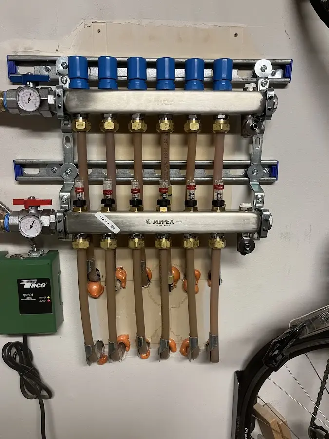 Plumber performing Gas Leak Detection at a residential property in Syracuse